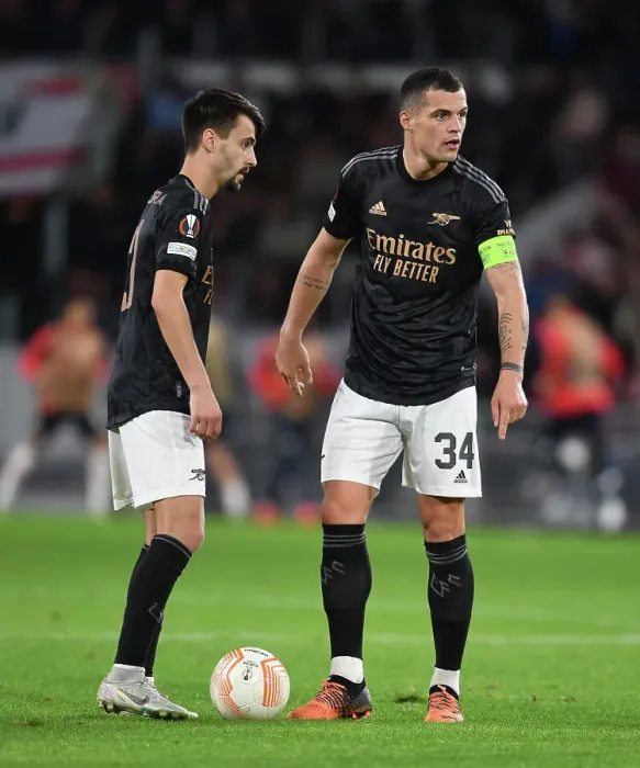 Framed Print : Fabio Vieira and Granit Xhaka Clash in Europa League: PSV Eindhoven vs. Arsenal (2022-23) Framed Print : Fabio Vieira and Granit Xhaka Clash in Europa League: PSV Eindhoven vs. Arsenal (2022-23)