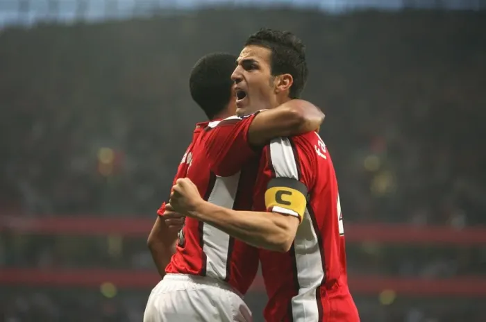 Framed Print : Fabregas and Walcott's Euphoric Goal Celebration: Arsenal's Unforgettable 3:0 UEFA Champions League Victory over Villarreal