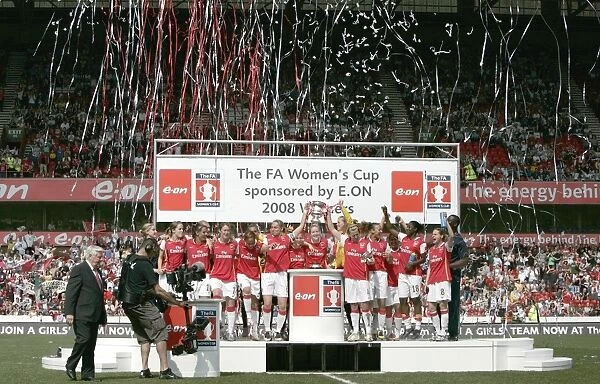 Faye White and Jayne Ludlow (Arsenal) lift the FA Cup