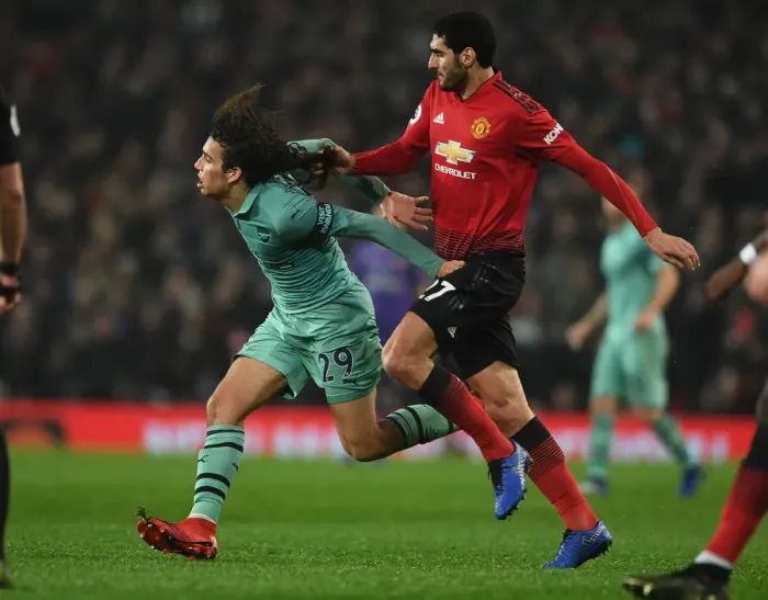 Framed Print : Fellaini vs. Guendouzi: Intense Rivalry at Old Trafford (Manchester United v Arsenal 2018-19)