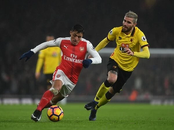 Fierce Rivalry: Sanchez vs. Behrami Clash in Arsenal vs. Watford Showdown