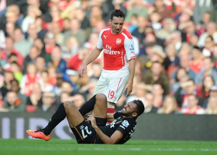 Framed Print : Fierce Rivalry: Santi Cazorla vs. Ahmed Elmohamady - A Battle at the Emirates, 2014-15 Premier League Framed Print : Fierce Rivalry: Santi Cazorla vs. Ahmed Elmohamady - A Battle at the Emirates, 2014-15 Premier League