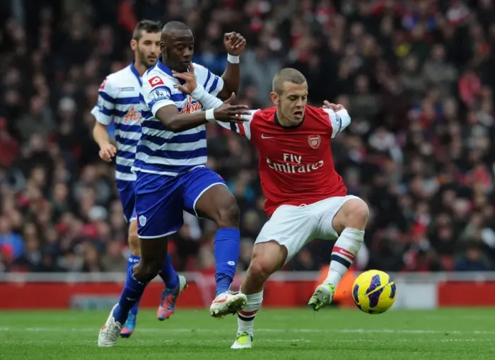 Framed Print : Fierce Rivalry: Wilshere vs. Diakite - A Battle in the Heart of the 2012-13 Premier League