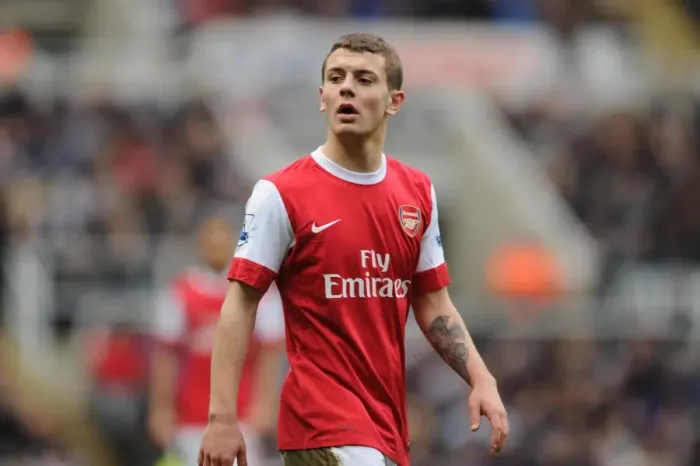 Framed Print : Fierce Rivalry: Wilshere's Thrilling 4-4 Battle at St. James Park