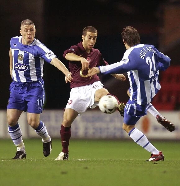 Flamini, Kavanagh, and Bullard: Wigan's Surprise 1-0 Victory Over Arsenal in Carling Cup Semi-Final First Leg