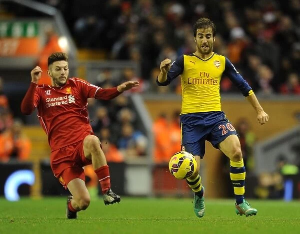 Flamini vs Lallana: Intense Battle in the Premier League Clash Between Liverpool and Arsenal
