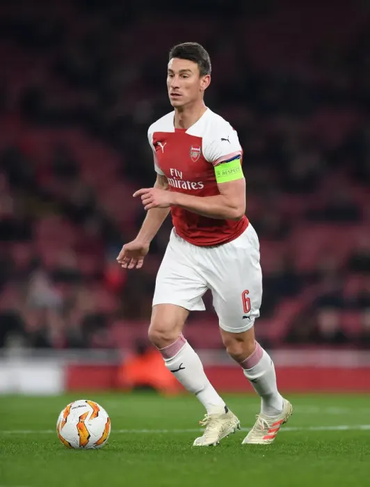 Framed Print : Focused Koscielny: Arsenal's Unyielding Defender in Europa League Battle Framed Print : Focused Koscielny: Arsenal's Unyielding Defender in Europa League Battle