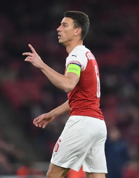 Framed Print : Focused Koscielny: Arsenal's Unyielding Defender in Europa League Battle