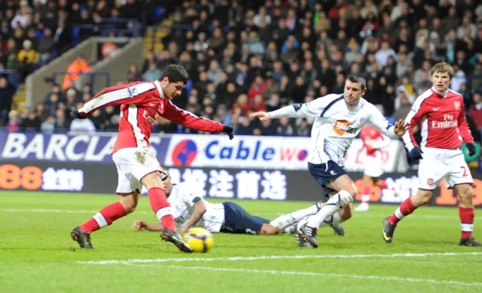 Framed Print : Fran Merida shoots past Bolton goalkeeper Jussi Jskelainen to score the 2nd Arsenal goal Framed Print : Fran Merida shoots past Bolton goalkeeper Jussi Jskelainen to score the 2nd Arsenal goal