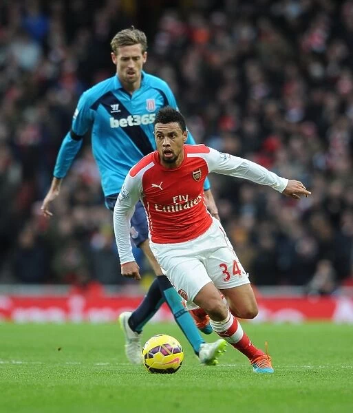 Francis Coquelin: Arsenal's Midfield Maestro in Action Against Stoke City (2014-15)