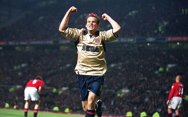 Fredrik Ljungberg celebrates the Arsenal goal, scored by Sylvain Wiltord