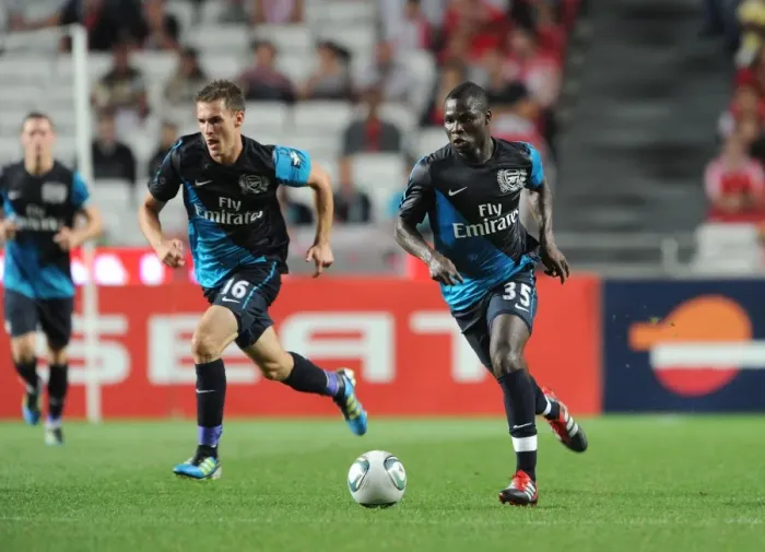 Framed Print : Frimpong and Ramsey: Arsenal's Midfield Duo Shine in Pre-Season Friendly Against Benfica (2011) Framed Print : Frimpong and Ramsey: Arsenal's Midfield Duo Shine in Pre-Season Friendly Against Benfica (2011)