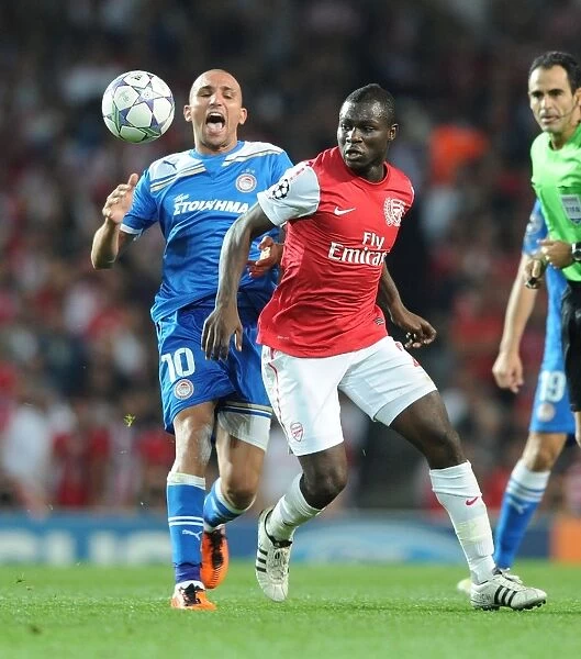 Frimpong Steals the Ball from Djebbour in Thrilling Arsenal-Olympiacos UCL Clash