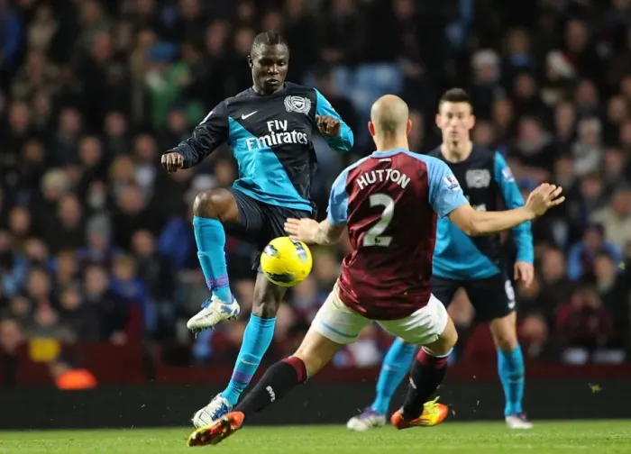 Framed Print : Frimpong vs Hutton: Intense Battle in Aston Villa vs Arsenal Premier League Clash Framed Print : Frimpong vs Hutton: Intense Battle in Aston Villa vs Arsenal Premier League Clash