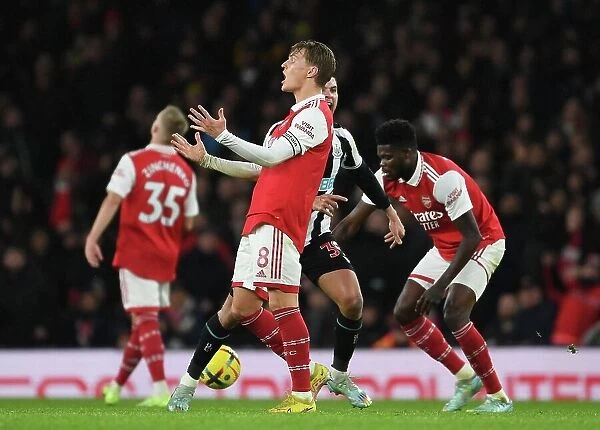 Frustrated Odegaard Leads Arsenal in Intense Premier League Battle Against Newcastle