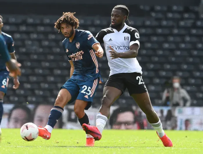 Framed Print : Fulham vs Arsenal: Elneny Evades Onomah at Craven Cottage (Premier League 2020-21)
