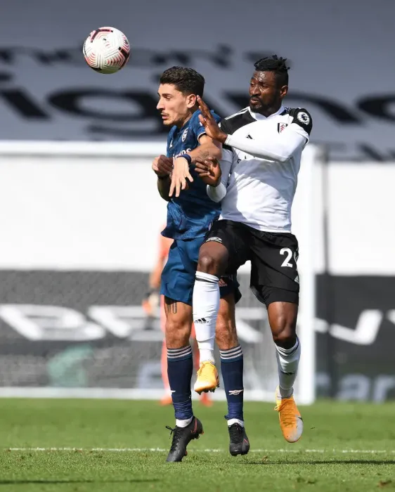 Framed Print : Fulham vs Arsenal: Hector Bellerin Clashes with Andre-Frank Anguissa in Premier League Showdown Framed Print : Fulham vs Arsenal: Hector Bellerin Clashes with Andre-Frank Anguissa in Premier League Showdown