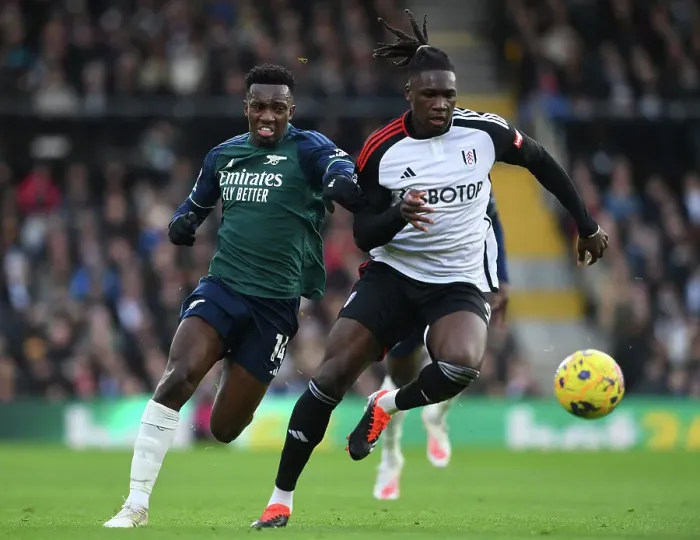 Framed Print : Fulham vs Arsenal: Nketiah Clashes with Bassey in Premier League Showdown (2023-24) Framed Print : Fulham vs Arsenal: Nketiah Clashes with Bassey in Premier League Showdown (2023-24)