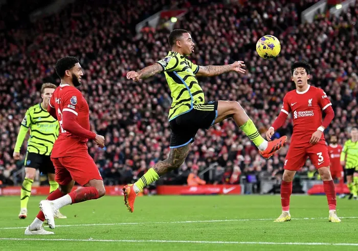 Framed Print : Gabriel Jesus vs Joe Gomez: Intense Battle at Anfield - Liverpool vs Arsenal, Premier League 2023-24