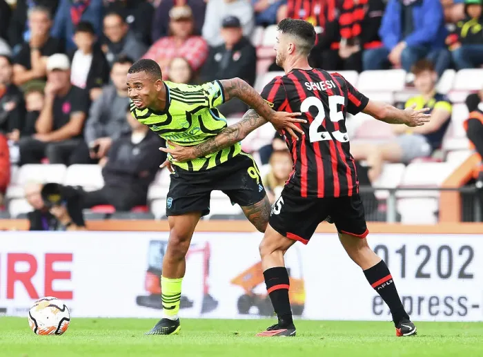 Framed Print : Gabriel Jesus vs Marcos Senesi: Intense Battle in AFC Bournemouth vs Arsenal FC, Premier League 2023-24