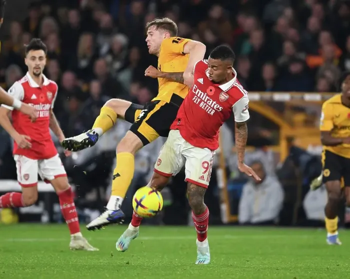 Framed Print : Gabriel Jesus vs. Nathan Collins: A Clash of Strength in the Wolverhampton Wanderers vs. Arsenal FC Showdown