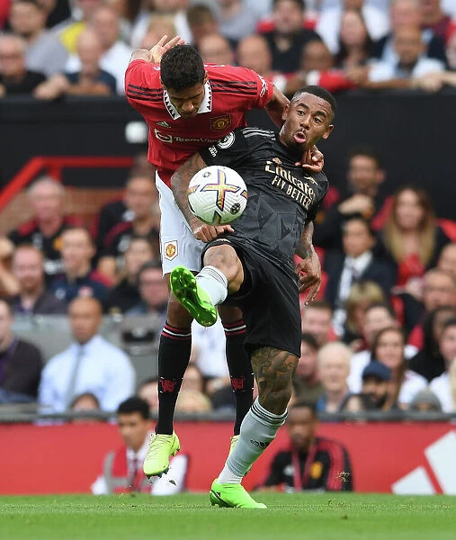 Gabriel Jesus vs. Raphael Varane: A Premier League Battle at Old Trafford - Manchester United vs. Arsenal, 2022-23