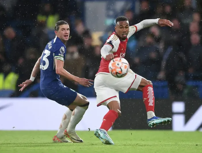 Framed Print : Gabriel Magalhaes vs Conor Gallagher: Intense Battle at Stamford Bridge - Chelsea vs Arsenal, Premier League 2023-24