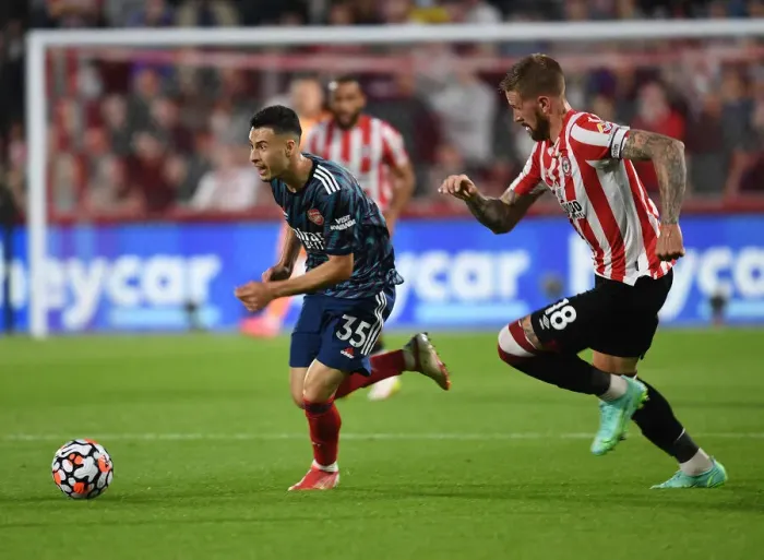 Framed Print : Gabriel Martinelli Clashes with Pontus Jansson: Brentford vs Arsenal, Premier League 2021-22