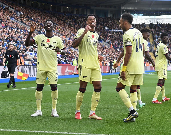 Gabriel, Saka, and Aubameyang Celebrate Arsenal's First Goal Against Leicester City (2021-22)