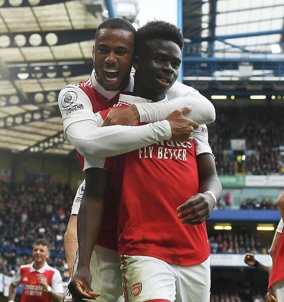 Gabriel and Saka Celebrate Arsenal's Goal Against Chelsea in Premier League Clash (2022-23)
