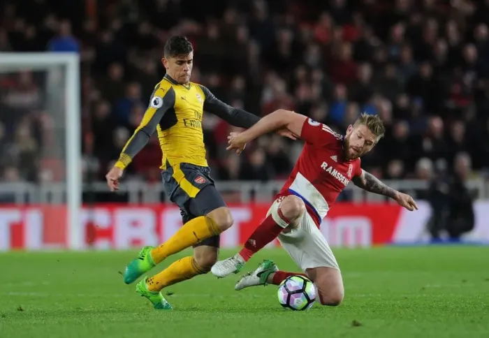 Framed Print : Gabriel vs. Adam Clayton: Intense Battle in Middlesbrough vs. Arsenal Premier League Clash