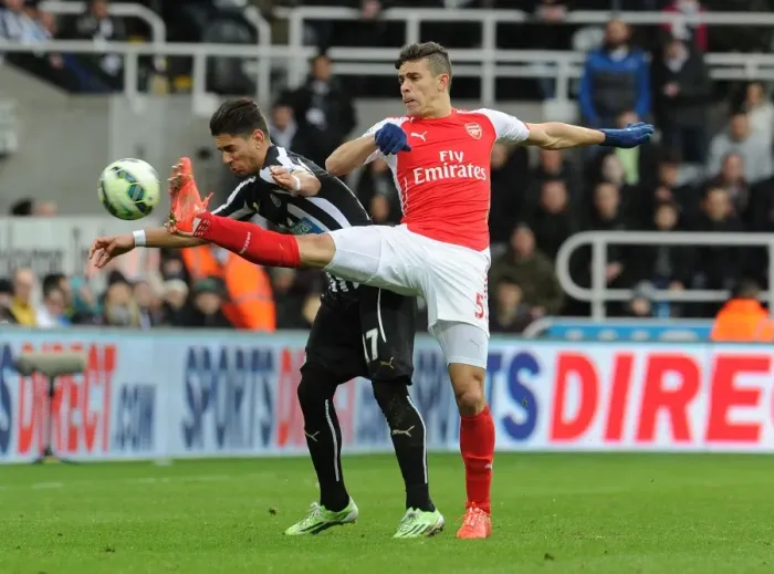 Framed Print : Gabriel vs. Ayoze Perez: Intense Battle in Newcastle United vs. Arsenal Premier League Clash Framed Print : Gabriel vs. Ayoze Perez: Intense Battle in Newcastle United vs. Arsenal Premier League Clash