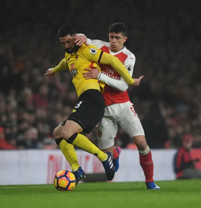 Framed Print : Gabriel vs. Britos: A Premier League Showdown at Emirates Stadium Framed Print : Gabriel vs. Britos: A Premier League Showdown at Emirates Stadium