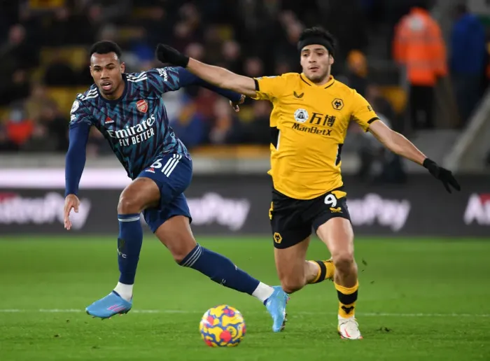 Framed Print : Gabriel vs. Jimenez: A Premier League Battle at Molineux