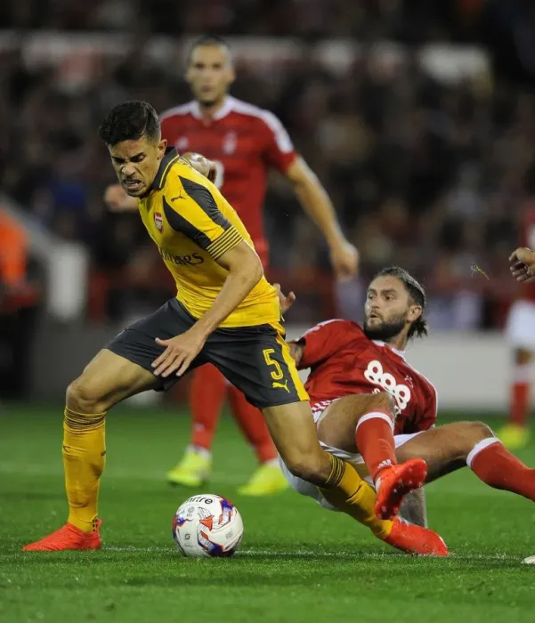 Framed Print : Gabriel vs Lansbury: A Battle in the EFL Cup Third Round - Nottingham Forest vs Arsenal Framed Print : Gabriel vs Lansbury: A Battle in the EFL Cup Third Round - Nottingham Forest vs Arsenal