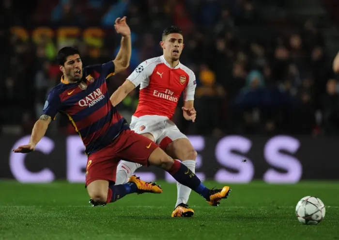 Framed Print : Gabriel vs. Luis Suarez: A Champion's Clash in the UEFA Champions League (Barcelona vs. Arsenal 2015-16)