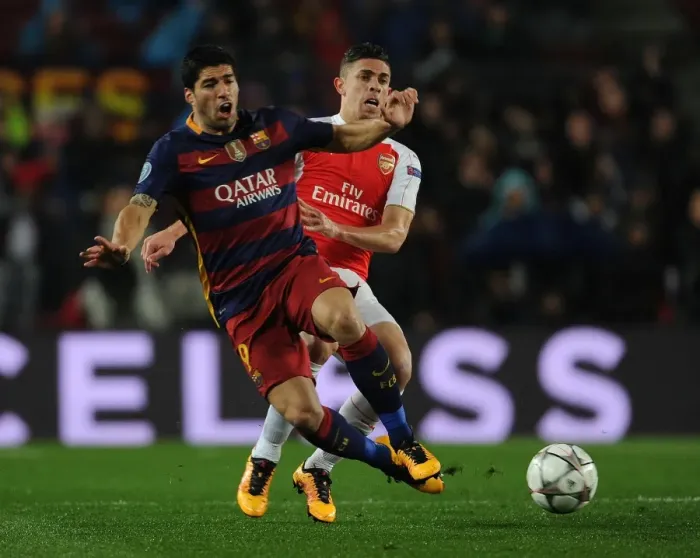 Framed Print : Gabriel vs. Luis Suarez: A Football Showdown in the UEFA Champions League - Arsenal vs. Barcelona Framed Print : Gabriel vs. Luis Suarez: A Football Showdown in the UEFA Champions League - Arsenal vs. Barcelona