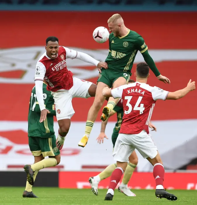 Framed Print : Gabriel vs McBurnie: A Battle at Empty Emirates - Arsenal vs Sheffield United, Premier League 2020-21