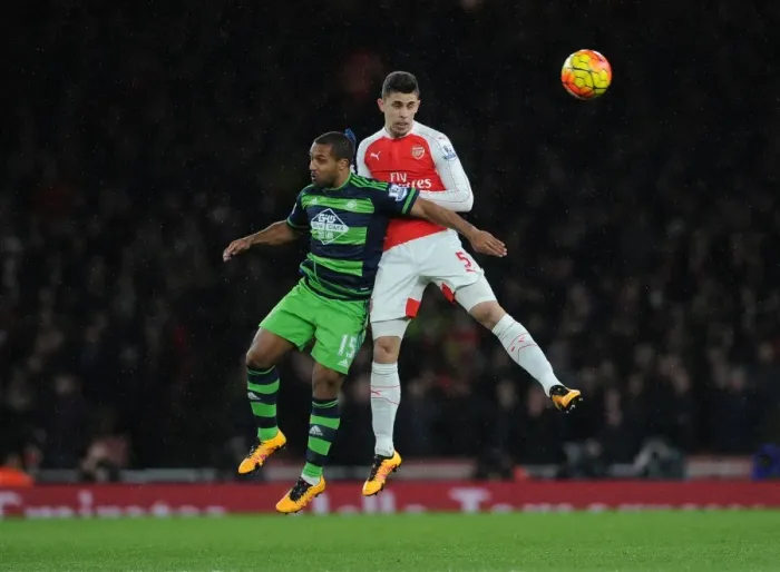 Framed Print : Gabriel vs Routledge: Intense Clash in Arsenal vs Swansea City Premier League Battle Framed Print : Gabriel vs Routledge: Intense Clash in Arsenal vs Swansea City Premier League Battle