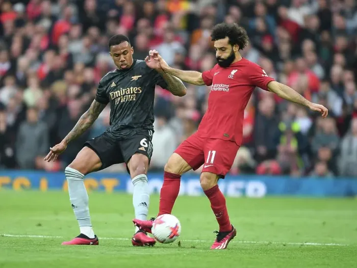 Framed Print : Gabriel vs. Salah: Intense Rivalry at Anfield - Liverpool vs. Arsenal, Premier League 2022-23