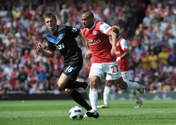 Framed Print : Gael Clichy (Arsenal) Michael Carrick (Man Utd). Arsenal 1: 0 Manchester United Framed Print : Gael Clichy (Arsenal) Michael Carrick (Man Utd). Arsenal 1: 0 Manchester United