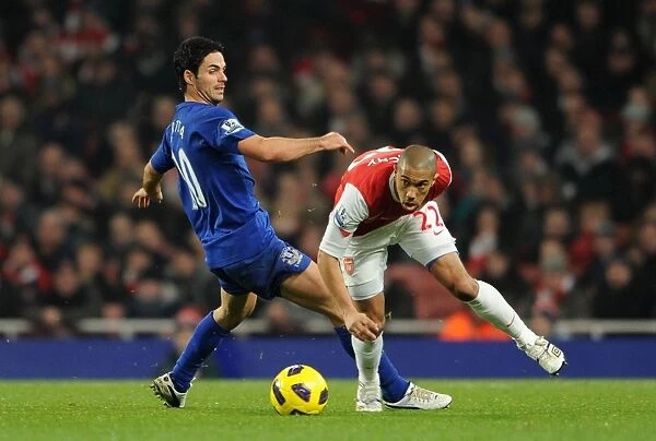 Gael Clichy (Arsenal) Mikel Arteta (Everton). Arsenal 2: 1 Everton. Barclays Premier League