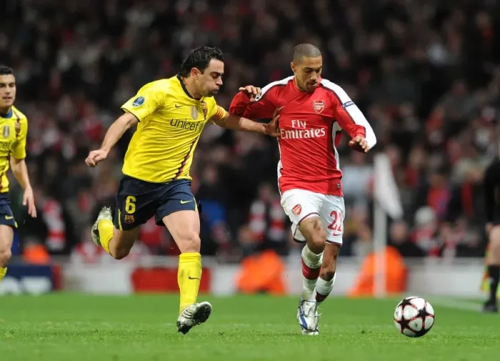 Framed Print : Gael Clichy (Arsenal) Xavi (Barcelona). Arsenal 2: 2 Barcelona, UEFA Champions League Framed Print : Gael Clichy (Arsenal) Xavi (Barcelona). Arsenal 2: 2 Barcelona, UEFA Champions League