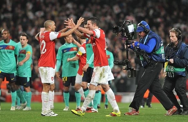 Gael Clichy and Robin van Persie (Arsenal) celebrate at the end of the match