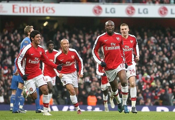 Gallas, Vela, Bendtner, and Silvestre: Arsenal's Unforgettable Celebration After Gallas Goal vs. Portsmouth (1:0), December 2008
