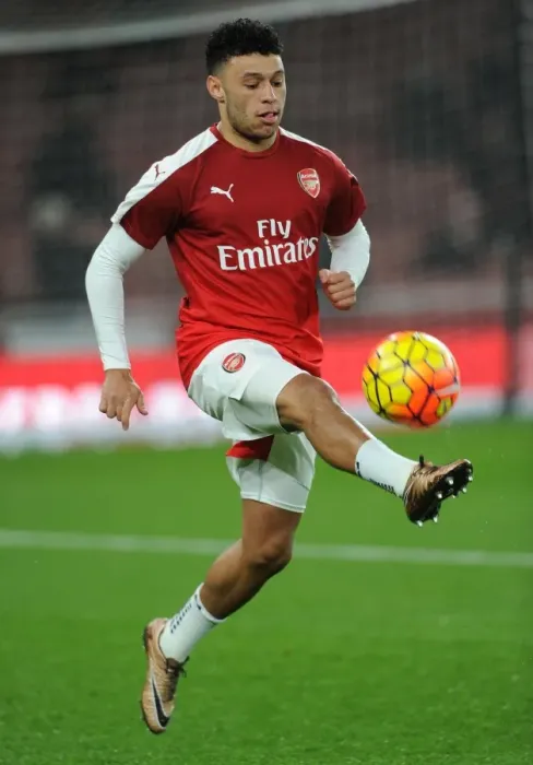 Framed Print : Gearing Up: Oxlade-Chamberlain's Pre-Match Routine at Emirates Stadium - Arsenal vs Southampton, Barclays Premier League Framed Print : Gearing Up: Oxlade-Chamberlain's Pre-Match Routine at Emirates Stadium - Arsenal vs Southampton, Barclays Premier League