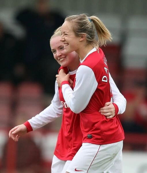 Gemma Davison celebrates scoring for Arsenal with Kim Little. Arsenal Ladies 9