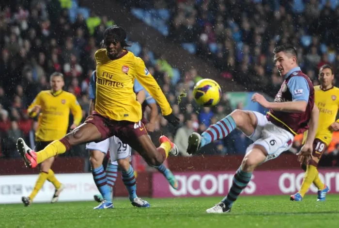 Framed Print : Gervinho (Arsenal) Ciaran Clark (Villa). Aston Villa 0: 0 Arsenal. Barclays Premier League