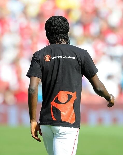 Gervinho (Arsenal) in a Save the Children t shirt. Arsenal 1: 1 New York Red Bulls