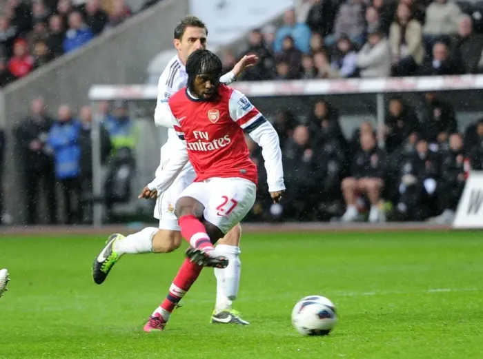 Framed Print : Gervinho Scores Against Angel Rangel: Swansea City vs. Arsenal, Premier League, 2013
